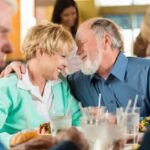 Elderly couple enjoying delicious food at Triple Crown Casinos in Cripple Creek