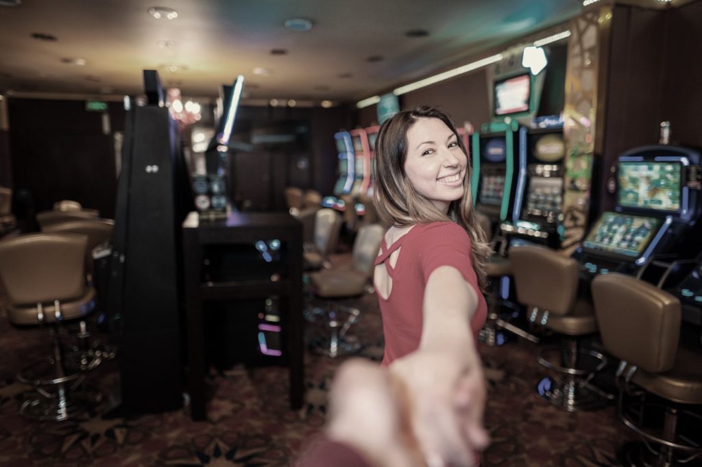 Enjoy Date Night at Triple Crown Casinos girl pulls her boyfriend into the casino to play the best poker games in Colorado