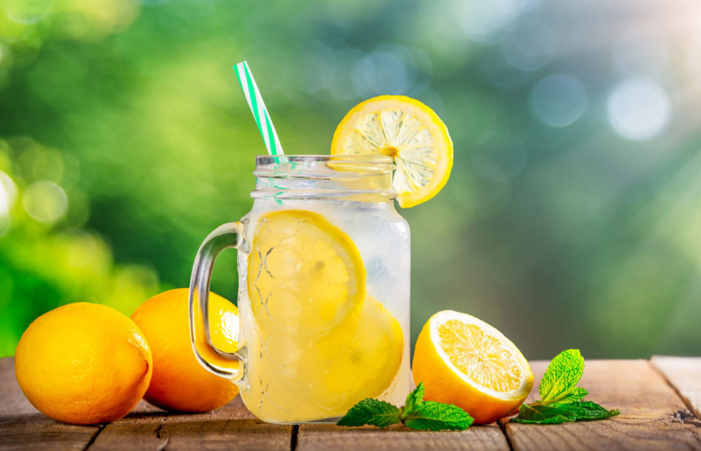 Fresh lemonade sitting on a bench representing summertime in Cripple Creek, CO