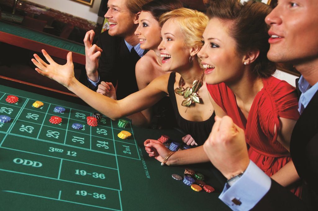 Group of friends enjoying in a casino