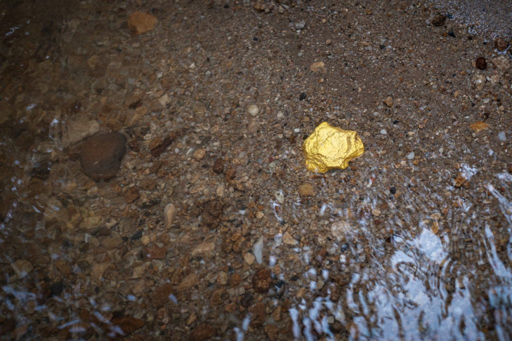 Pure gold nugget ore found in mine with natural water sources