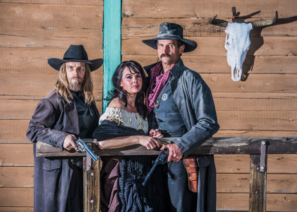 Portrait of three old west citizens