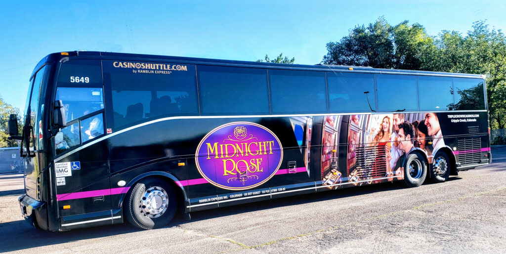Ramblin Express bus with Midnight Rose pictured on the side
