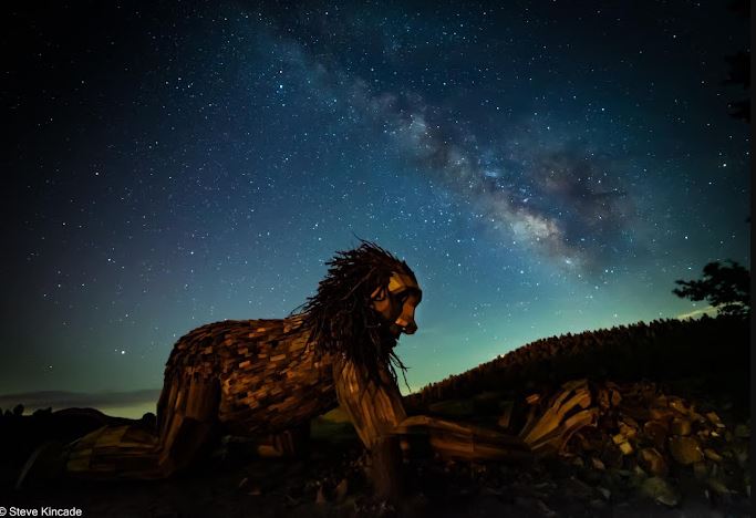 The night sky behind Rita the Rock Planter in Victor, Colorado