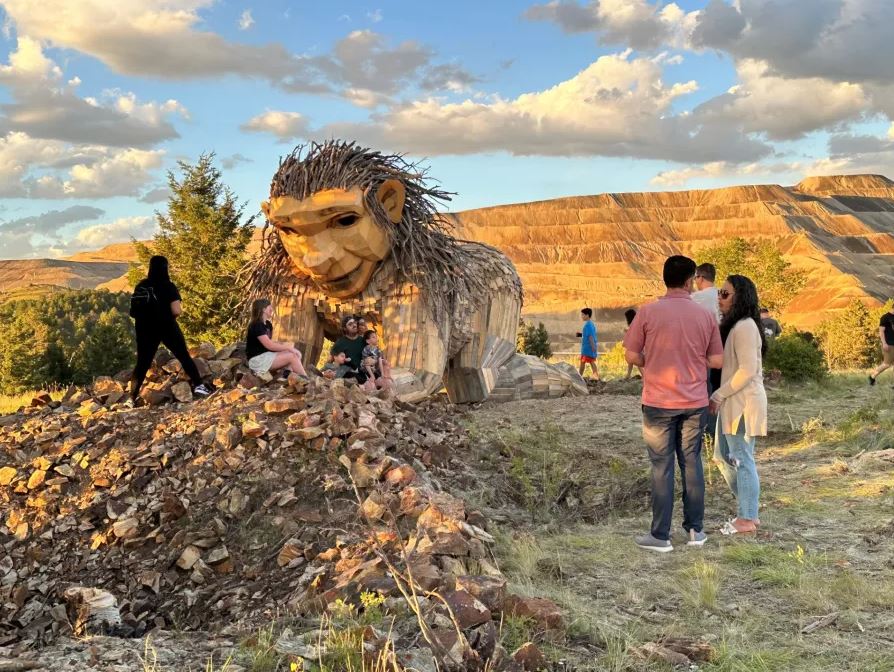 Visitors around the Rita the Rock Planter sculpture