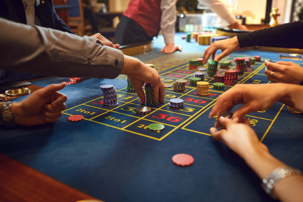 Chips set on the table at a Black Jack table inside a Casino.