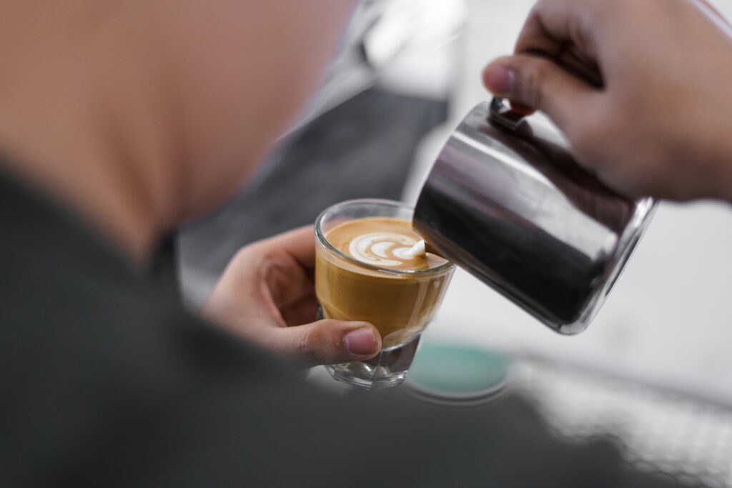 A shot of espresso being poured